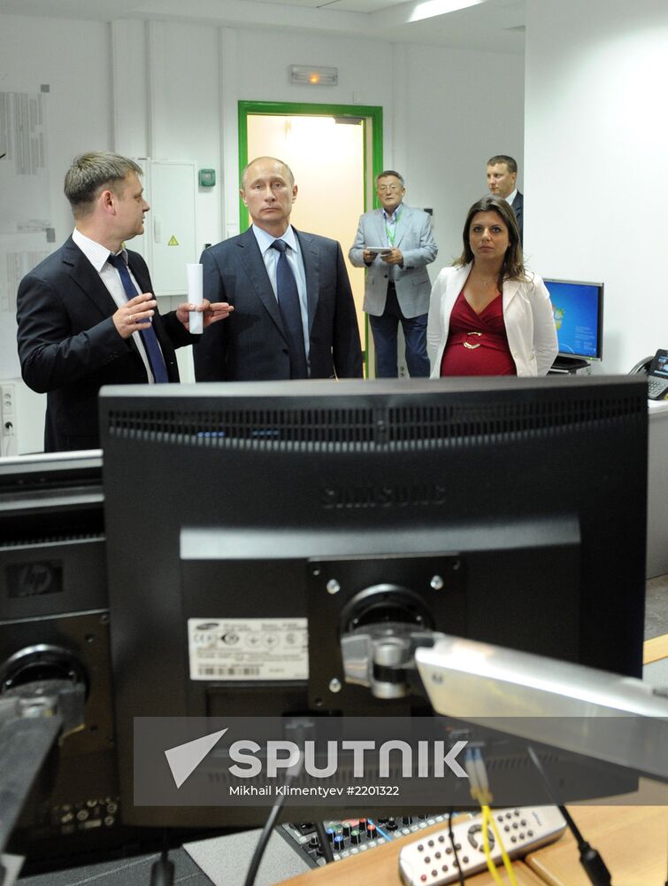 Vladimir Putin visits Russia Today television channel