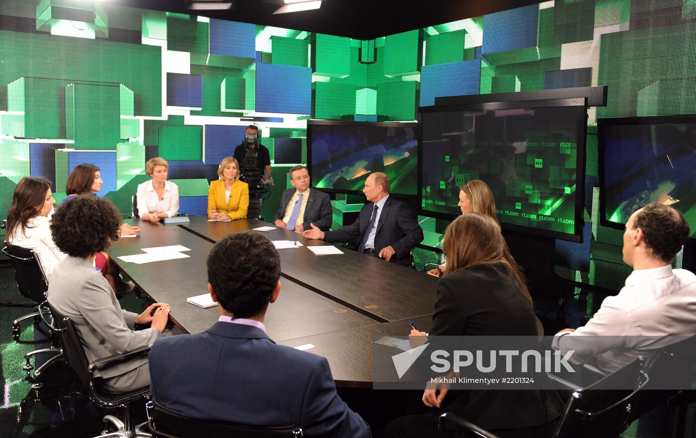 Vladimir Putin visits Russia Today television channel
