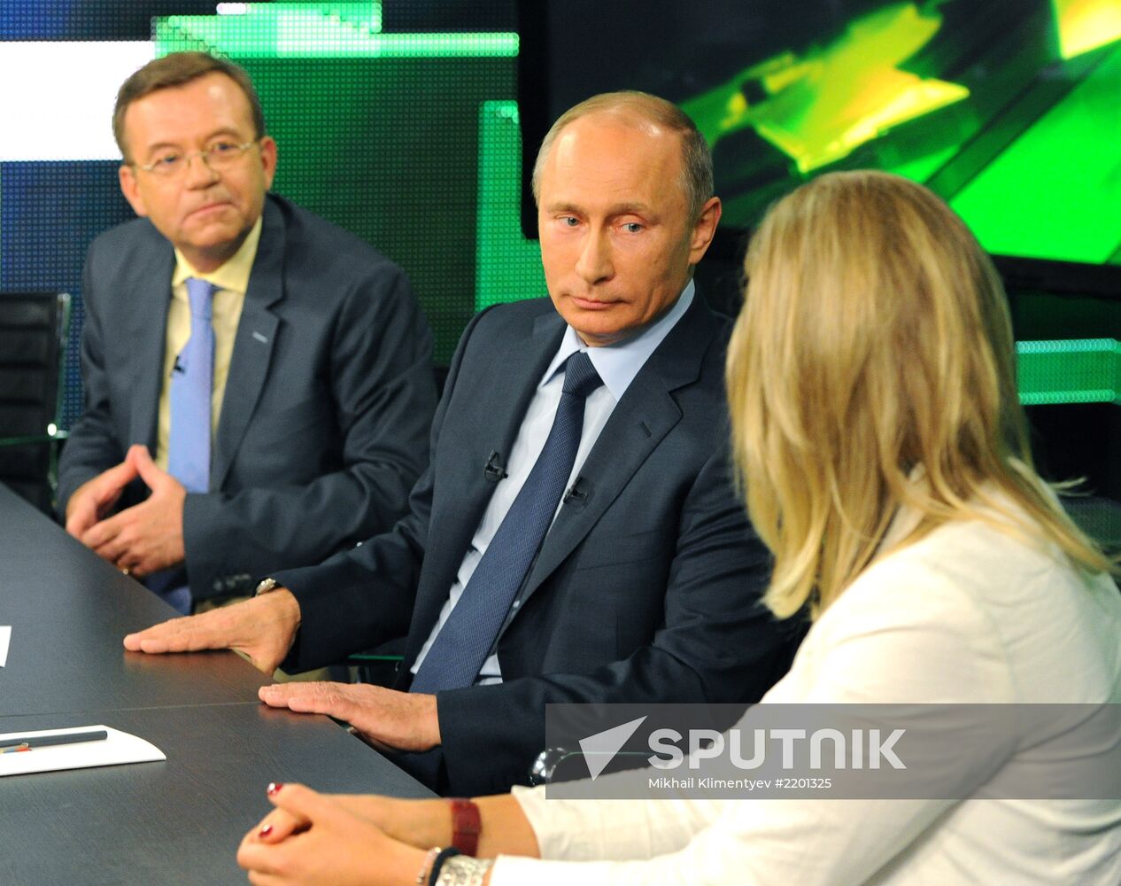 Vladimir Putin visits Russia Today television channel