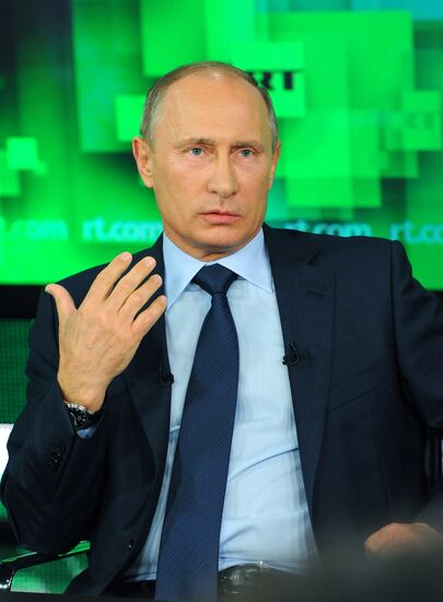 Vladimir Putin visits Russia Today television channel