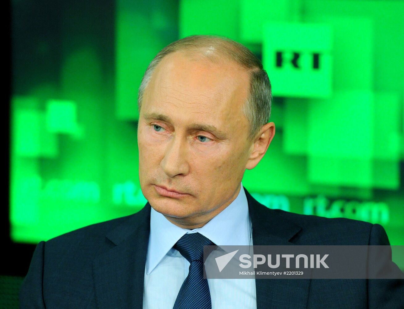 Vladimir Putin visits Russia Today television channel