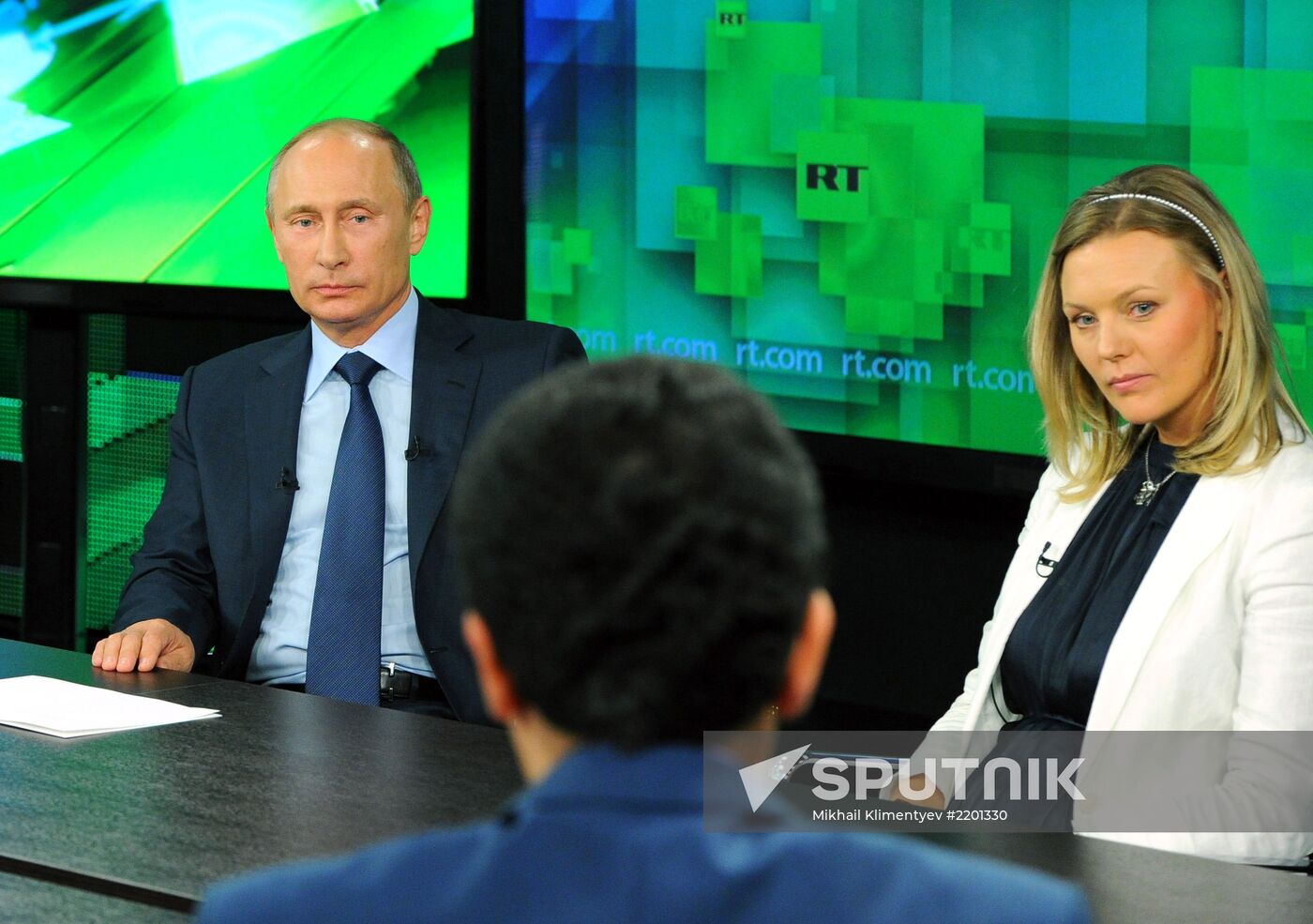 Vladimir Putin visits Russia Today television channel