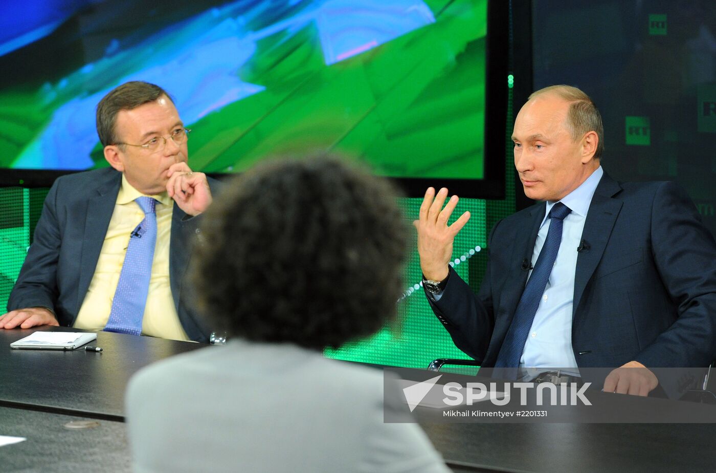 Vladimir Putin visits Russia Today television channel