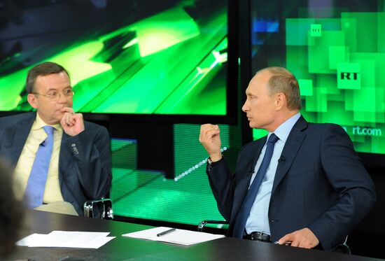 Vladimir Putin visits Russia Today television channel