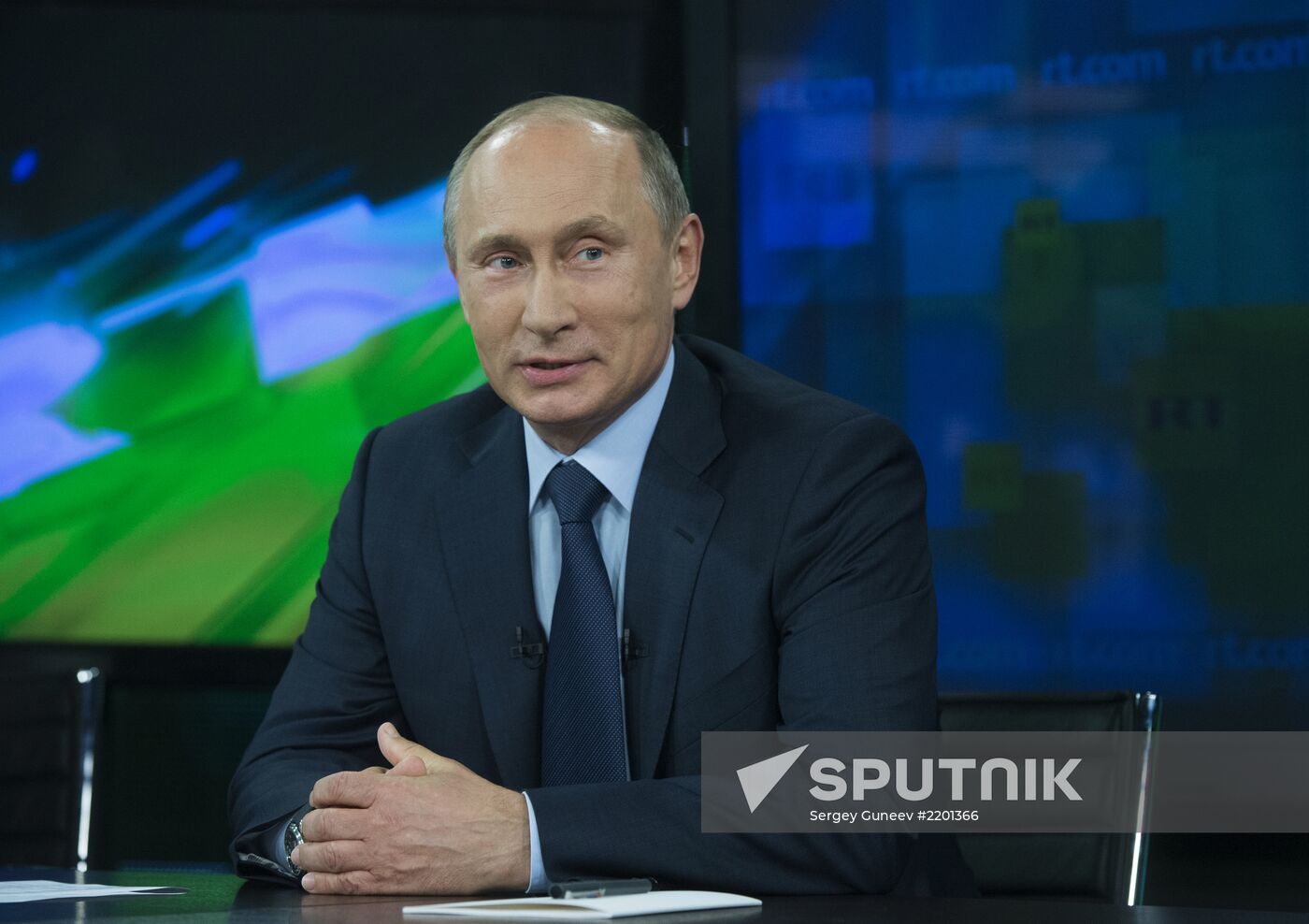 Vladimir Putin visits Russia Today television channel