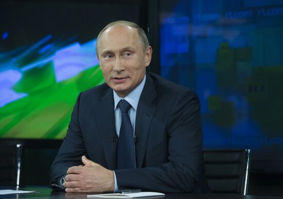 Vladimir Putin visits Russia Today television channel