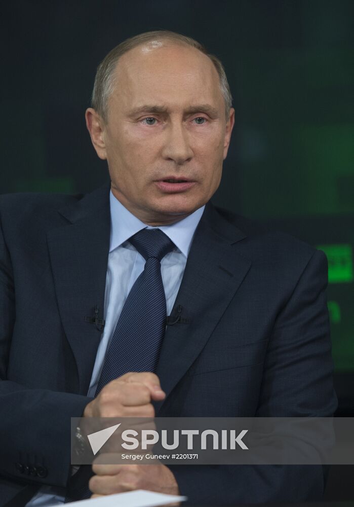 Vladimir Putin visits Russia Today television channel