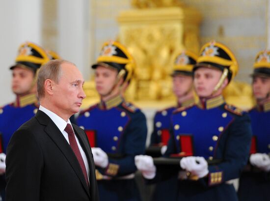 Vladimir Putin presents state awards