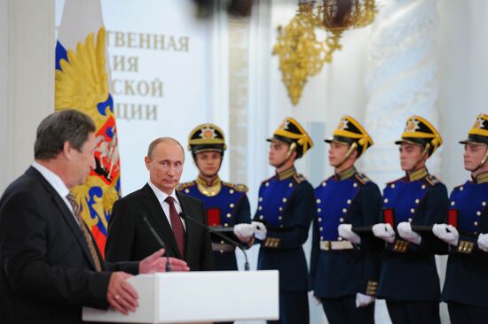 Vladimir Putin presents state awards