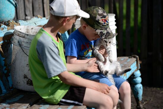 Teachers adopt foster children in Ivankino village