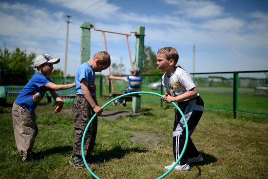 Teachers adopt foster children in Ivankino village