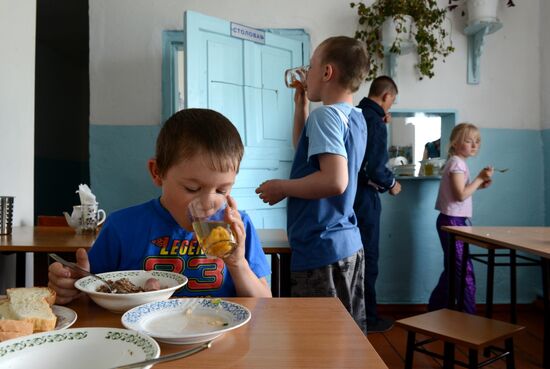 Teachers adopt foster children in Ivankino village