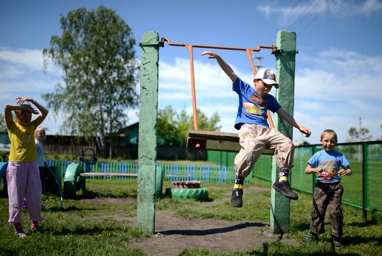 Teachers adopt foster children in Ivankino village