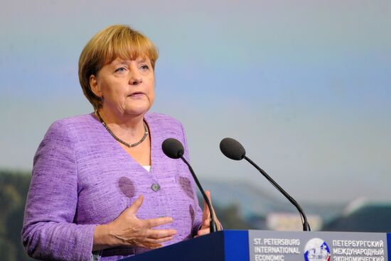 News conference of Vladimir Putin and Angela Merkel