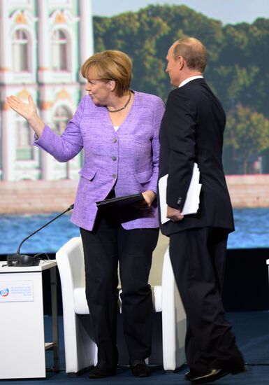 News conference of Vladimir Putin and Angela Merkel