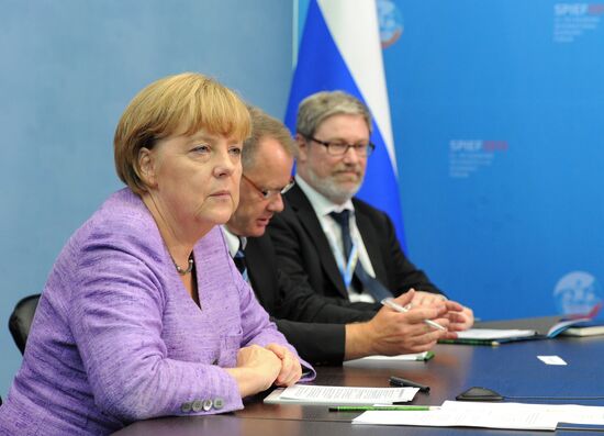 News conference of Vladimir Putin and Angela Merkel