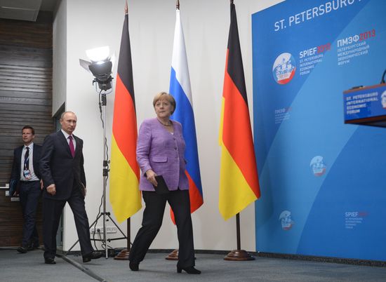 News conference of Vladimir Putin and Angela Merkel