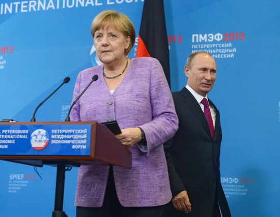 News conference of Vladimir Putin and Angela Merkel