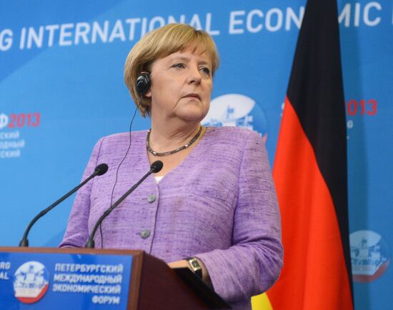 News conference of Vladimir Putin and Angela Merkel
