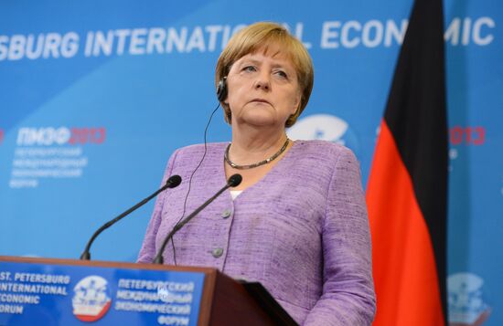 News conference of Vladimir Putin and Angela Merkel