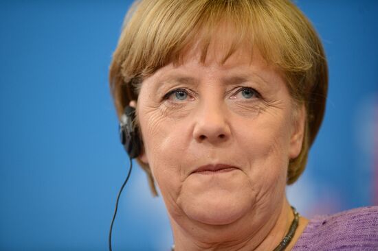 News conference of Vladimir Putin and Angela Merkel
