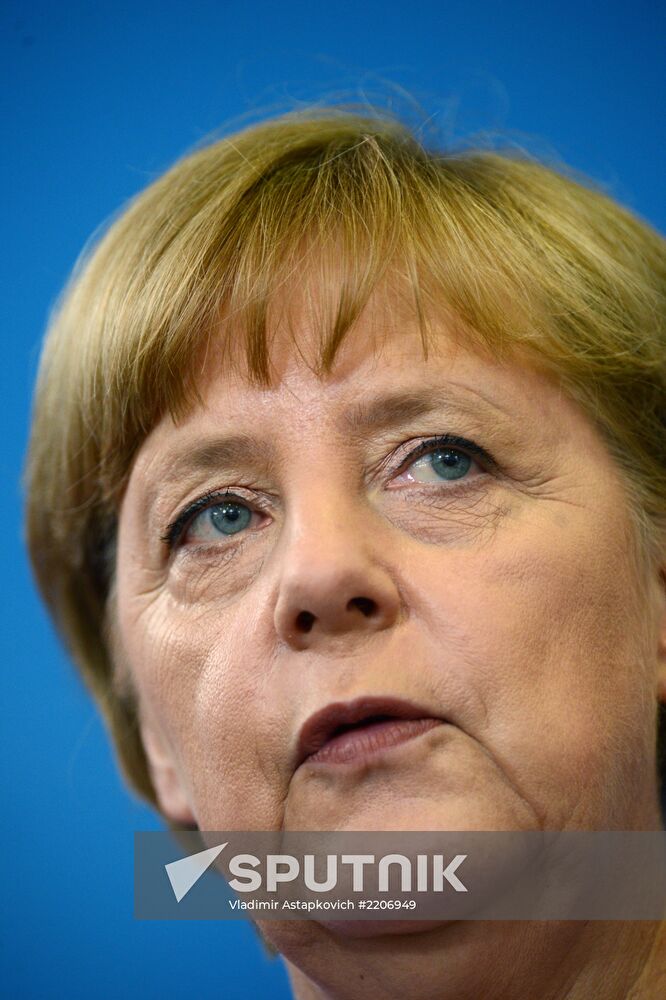 News conference of Vladimir Putin and Angela Merkel