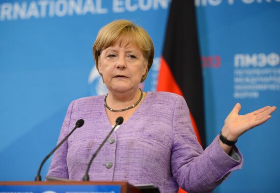 News conference of Vladimir Putin and Angela Merkel