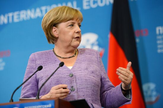News conference of Vladimir Putin and Angela Merkel