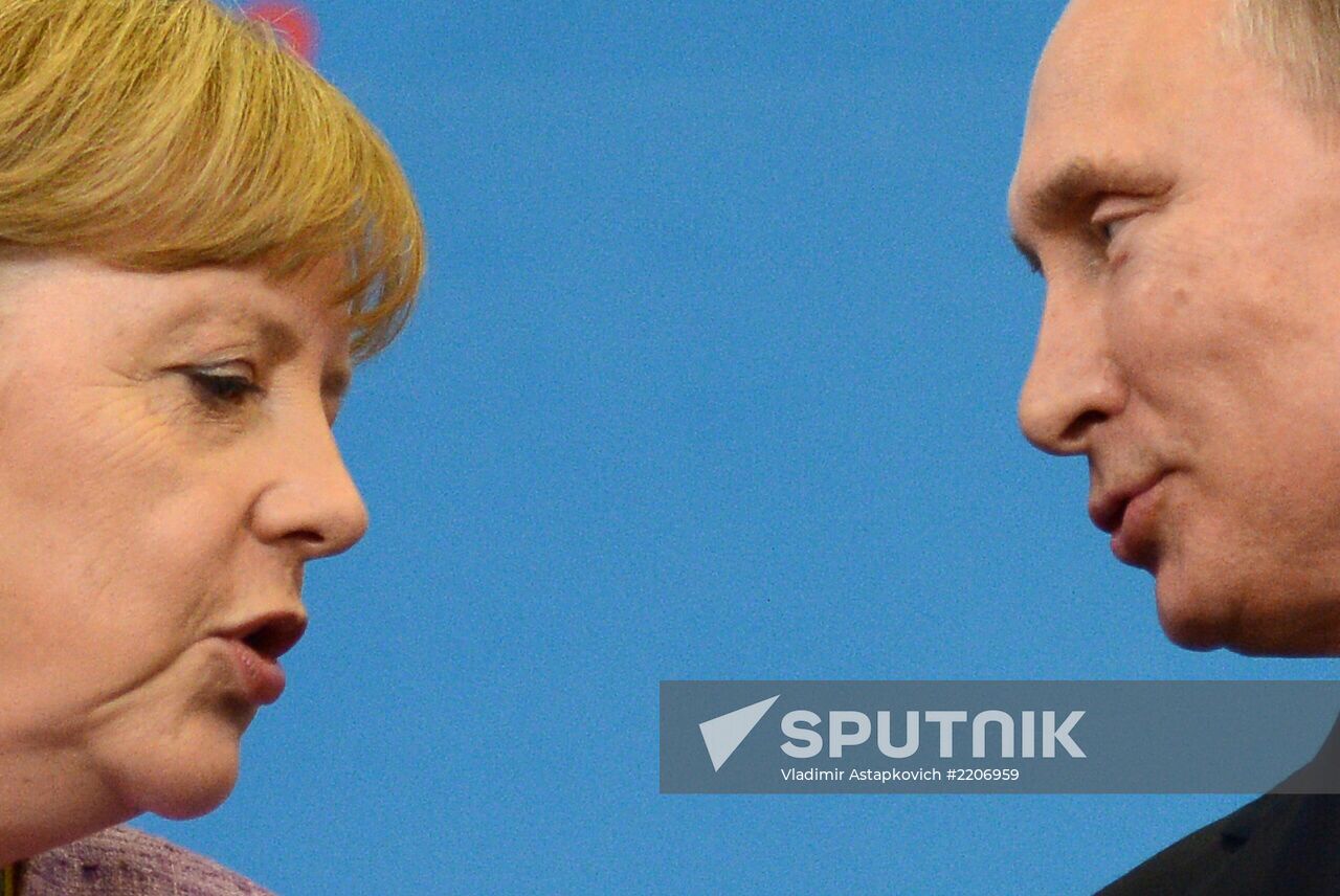 News conference of Vladimir Putin and Angela Merkel