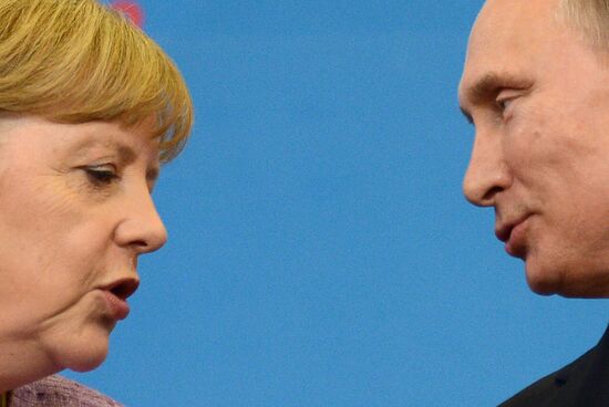 News conference of Vladimir Putin and Angela Merkel
