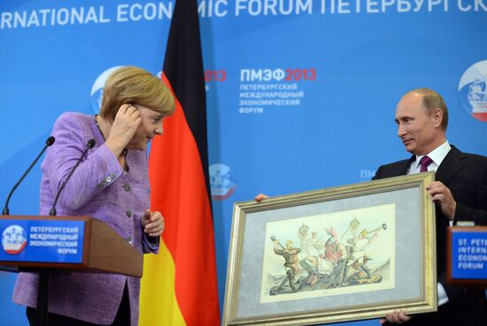 News conference of Vladimir Putin and Angela Merkel