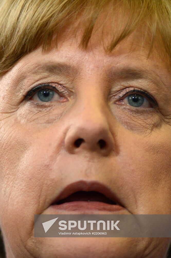 News conference of Vladimir Putin and Angela Merkel