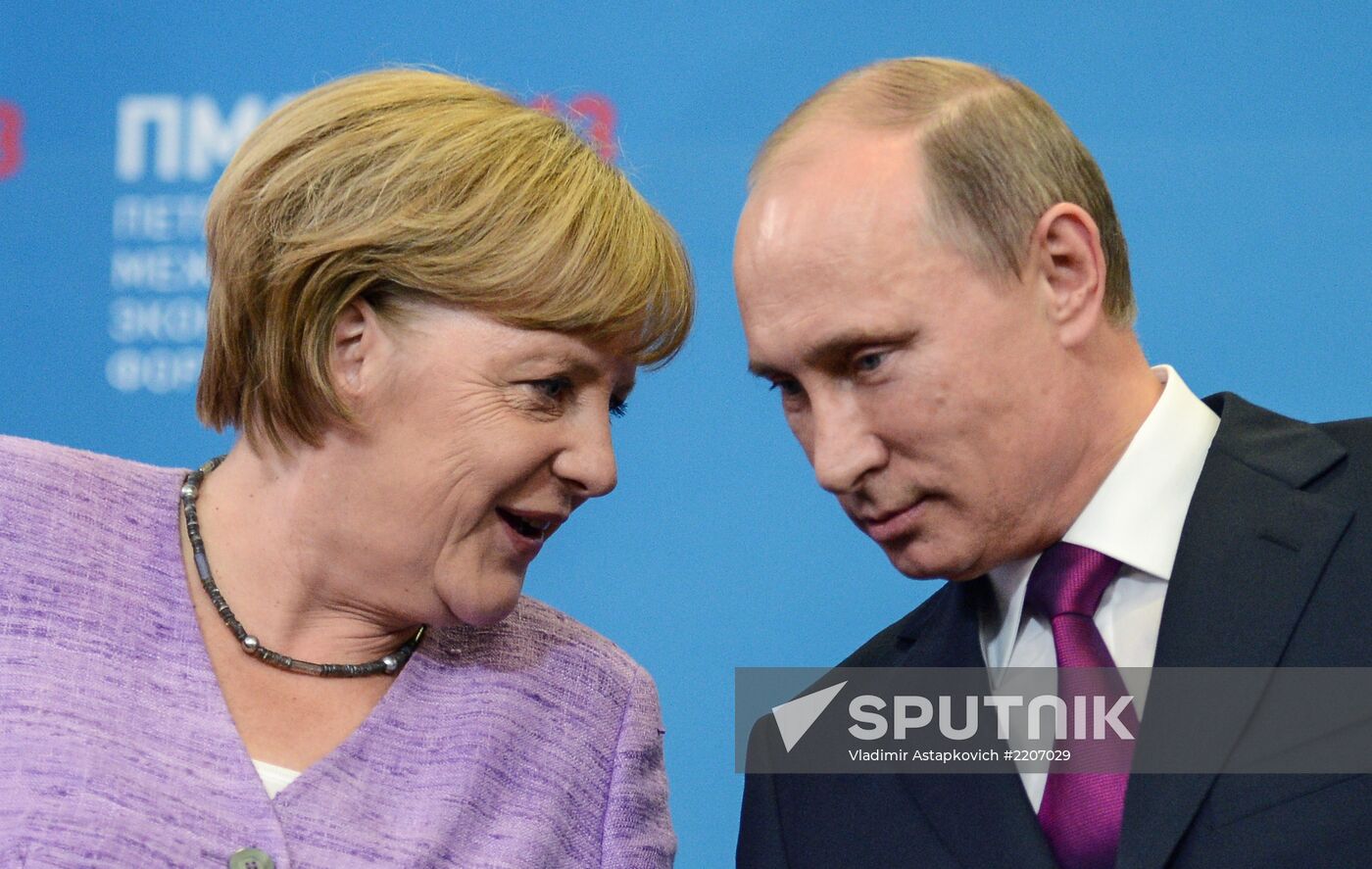 News conference of Vladimir Putin and Angela Merkel