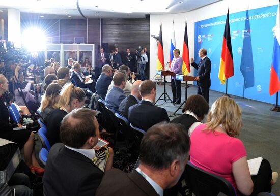 News conference of Vladimir Putin and Angela Merkel