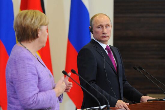 News conference of Vladimir Putin and Angela Merkel