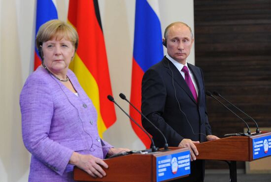 News conference of Vladimir Putin and Angela Merkel