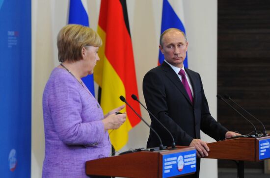 News conference of Vladimir Putin and Angela Merkel