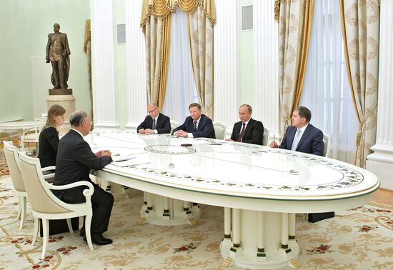 Vladimir Putin meets with Yukiya Amano