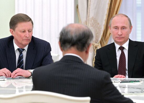 Vladimir Putin meets with Yukiya Amano