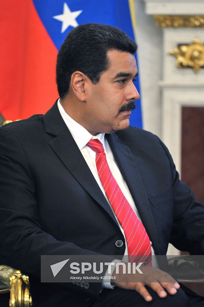 Russian President Vladimir Putin meets with Nicolás Maduro