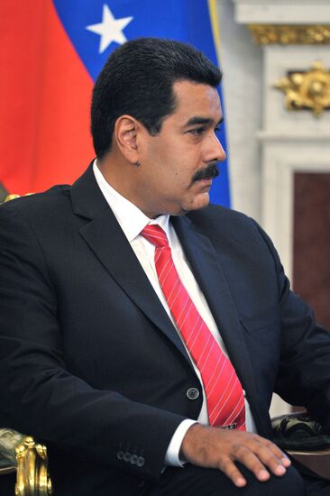 Russian President Vladimir Putin meets with Nicolás Maduro