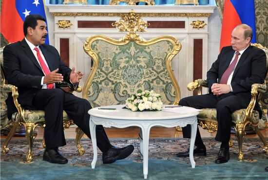 Russian President Vladimir Putin meets with Nicolás Maduro