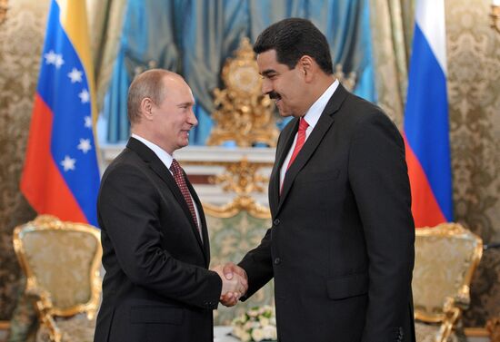 Russian President Vladimir Putin meets with Nicolás Maduro