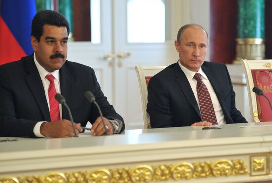 Russian President Vladimir Putin meets with Nicolás Maduro