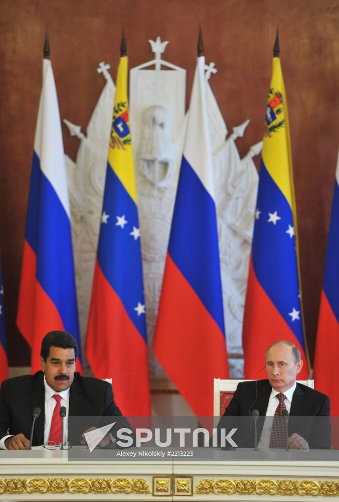 Russian President Vladimir Putin meets with Nicolás Maduro