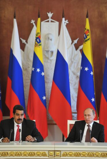Russian President Vladimir Putin meets with Nicolás Maduro
