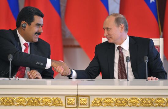 Russian President Vladimir Putin meets with Nicolás Maduro