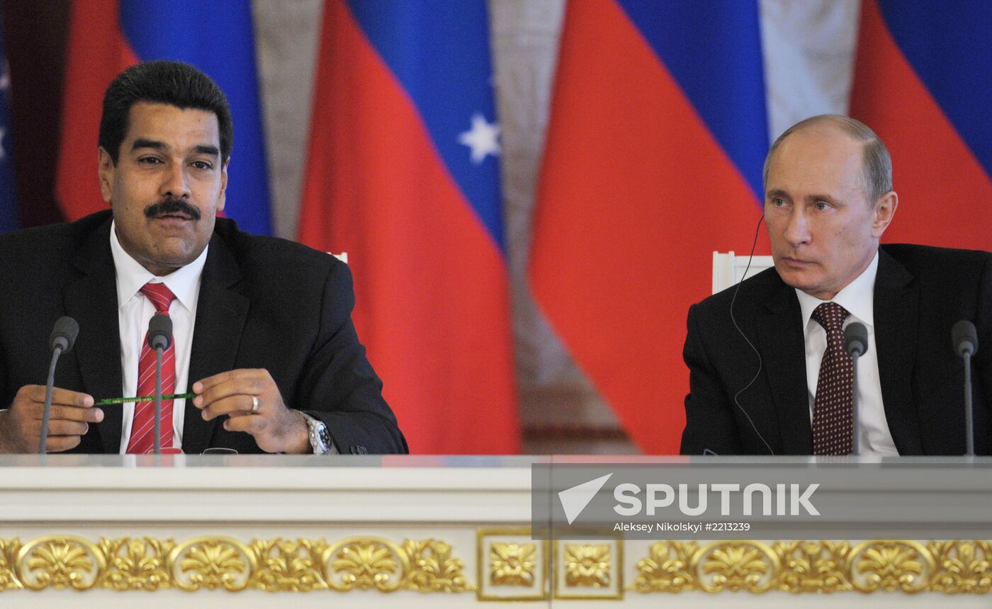 Russian President Vladimir Putin meets with Nicolás Maduro