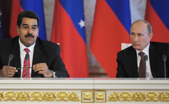 Russian President Vladimir Putin meets with Nicolás Maduro