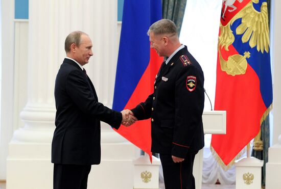 Vladimir Putin presents state awards